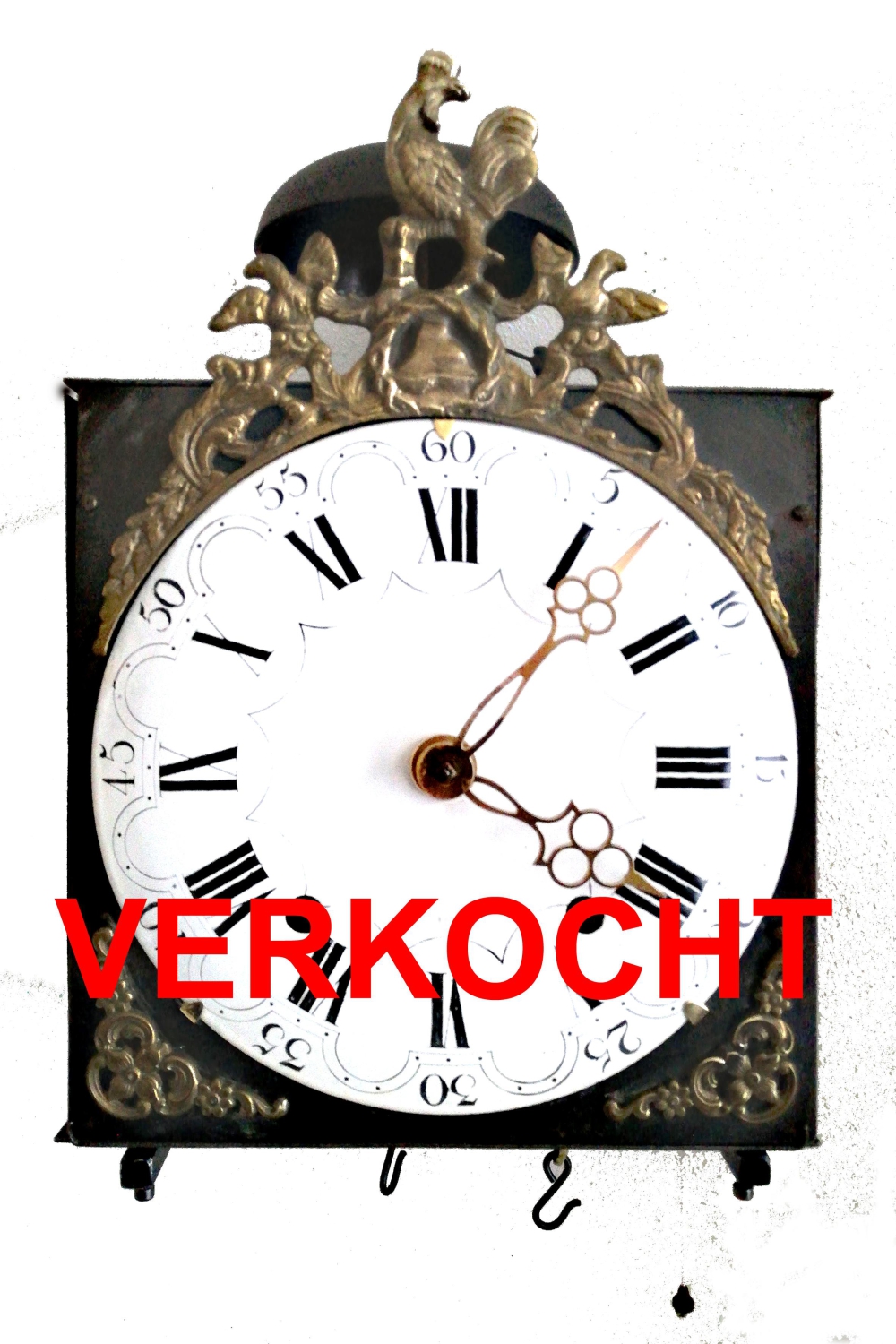 Comtoise klok met gietstuk Frygische muts